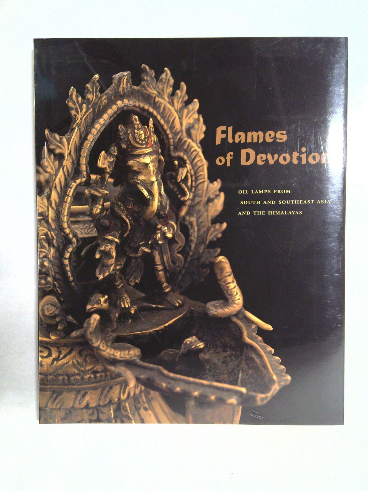 Flames of devotion: oil lamps from South and Southeast Asia and the Himalayas by Sean Anderson